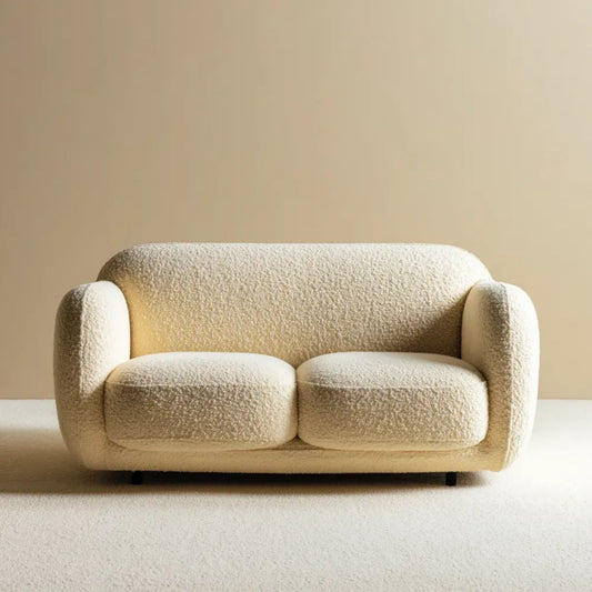 Kremowa sofa dwuosobowa z tapicerką bouclé i czarnymi nogami, 150 x 85 x 75 cm